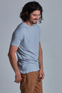 ONNO bamboo t-shirt in Sky Blue Unpatched, Nic is 5'11" and wearing size M.