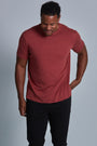 ONNO bamboo t-shirt in Brick Unpatched, Golden is 6'0" and wearing size L.