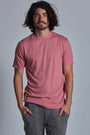 ONNO bamboo t-shirt in Vintage Pink Unpatched, Nic is 5'11" and wearing size M.