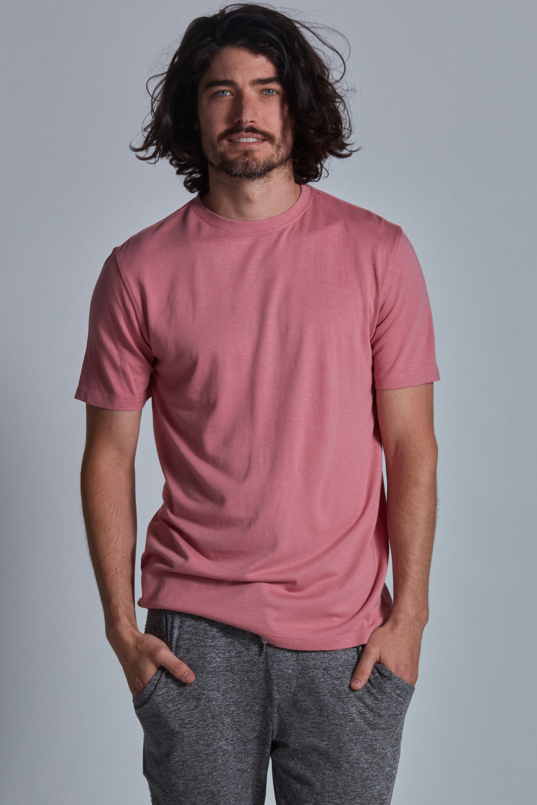 ONNO bamboo t-shirt in Vintage Pink Unpatched, Nic is 5'11" and wearing size M.