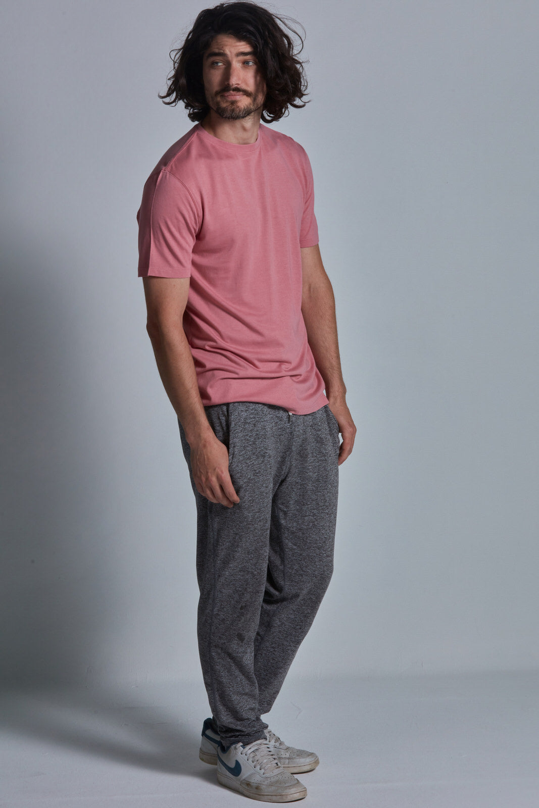 ONNO bamboo t-shirt in Vintage Pink Unpatched, Nic is 5'11" and wearing size M.