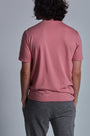 ONNO bamboo t-shirt in Vintage Pink Unpatched, Nic is 5'11" and wearing size M.
