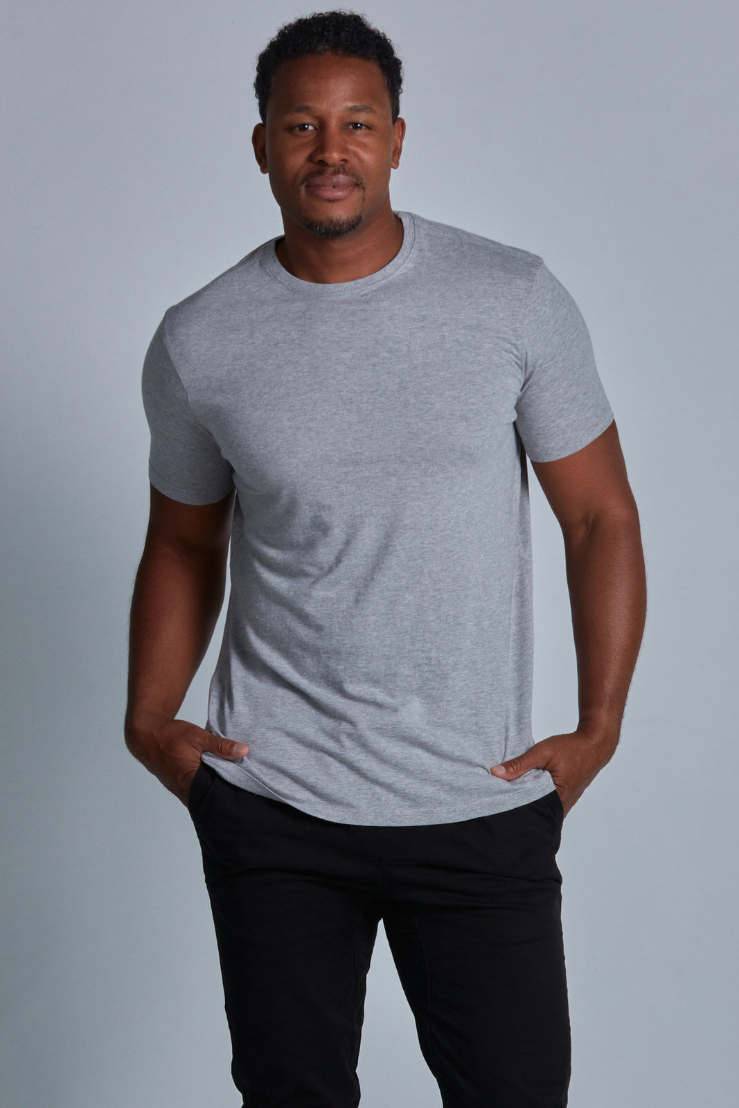 ONNO bamboo t-shirt in Heathered Granite Unpatched, Golden is 6'0" and wearing size L.