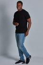 ONNO bamboo t-shirt in Black Unpatched, Golden is 6'0" and wearing size L.