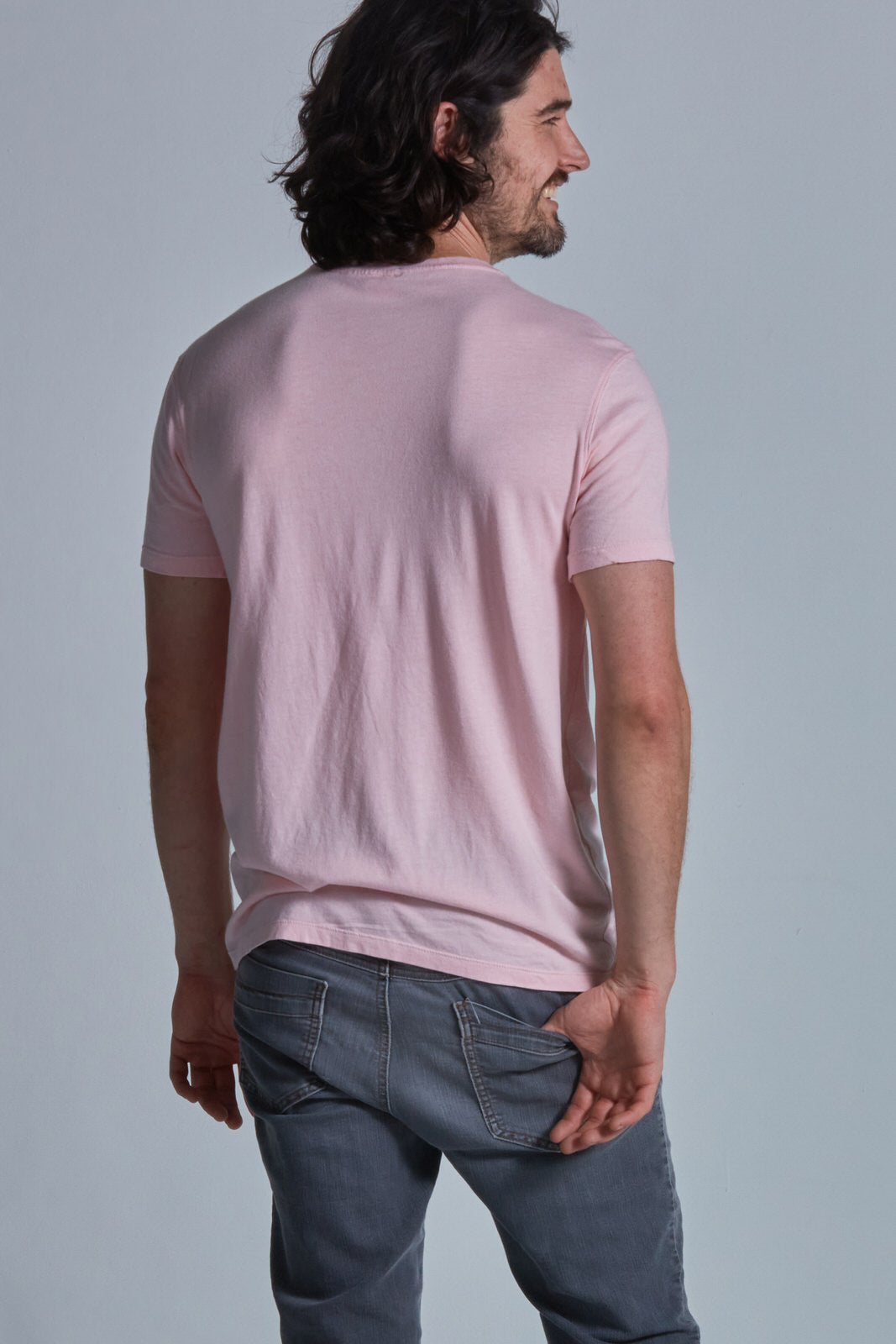 ONNO bamboo t-shirt in Pink Unpatched, Nic is 5'11" and wearing size M.