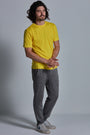 ONNO bamboo t-shirt in Bright Yellow Unpatched, Nic is 5'11" and wearing size M.