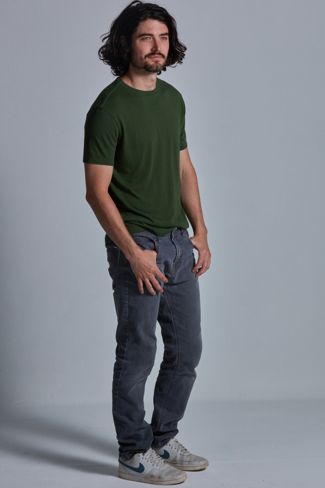 ONNO bamboo t-shirt in Moss Green Unpatched, Nic is 5'11" and wearing size M.