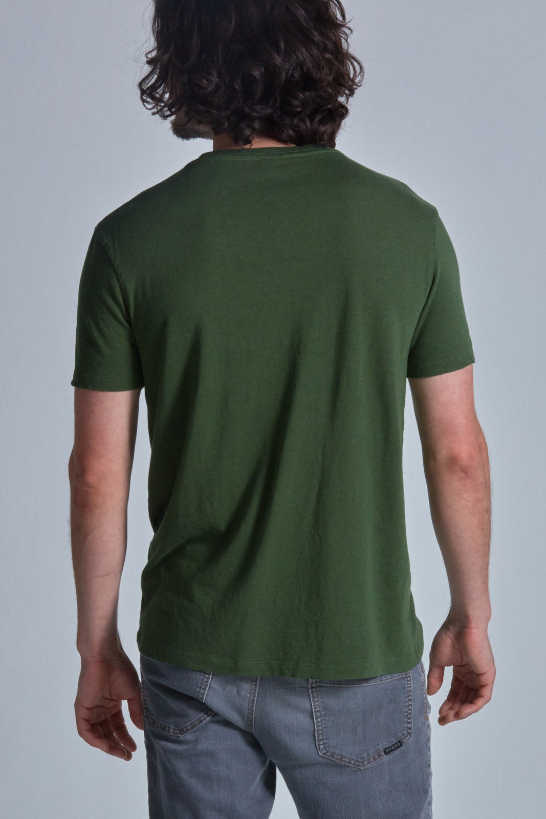 ONNO bamboo t-shirt in Moss Green Unpatched, Nic is 5'11" and wearing size M.