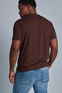 ONNO bamboo t-shirt in Espresso Unpatched, Golden is 6'0" and wearing size L.