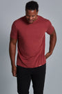 ONNO bamboo t-shirt in Brick, Golden is 6'0" and wearing size L.