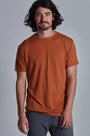 ONNO bamboo t-shirt in Rust, Nic is 5'11" and wearing size M.