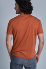 ONNO bamboo t-shirt in Rust, Nic is 5'11" and wearing size M.