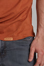 ONNO bamboo t-shirt in Rust, Nic is 5'11" and wearing size M.