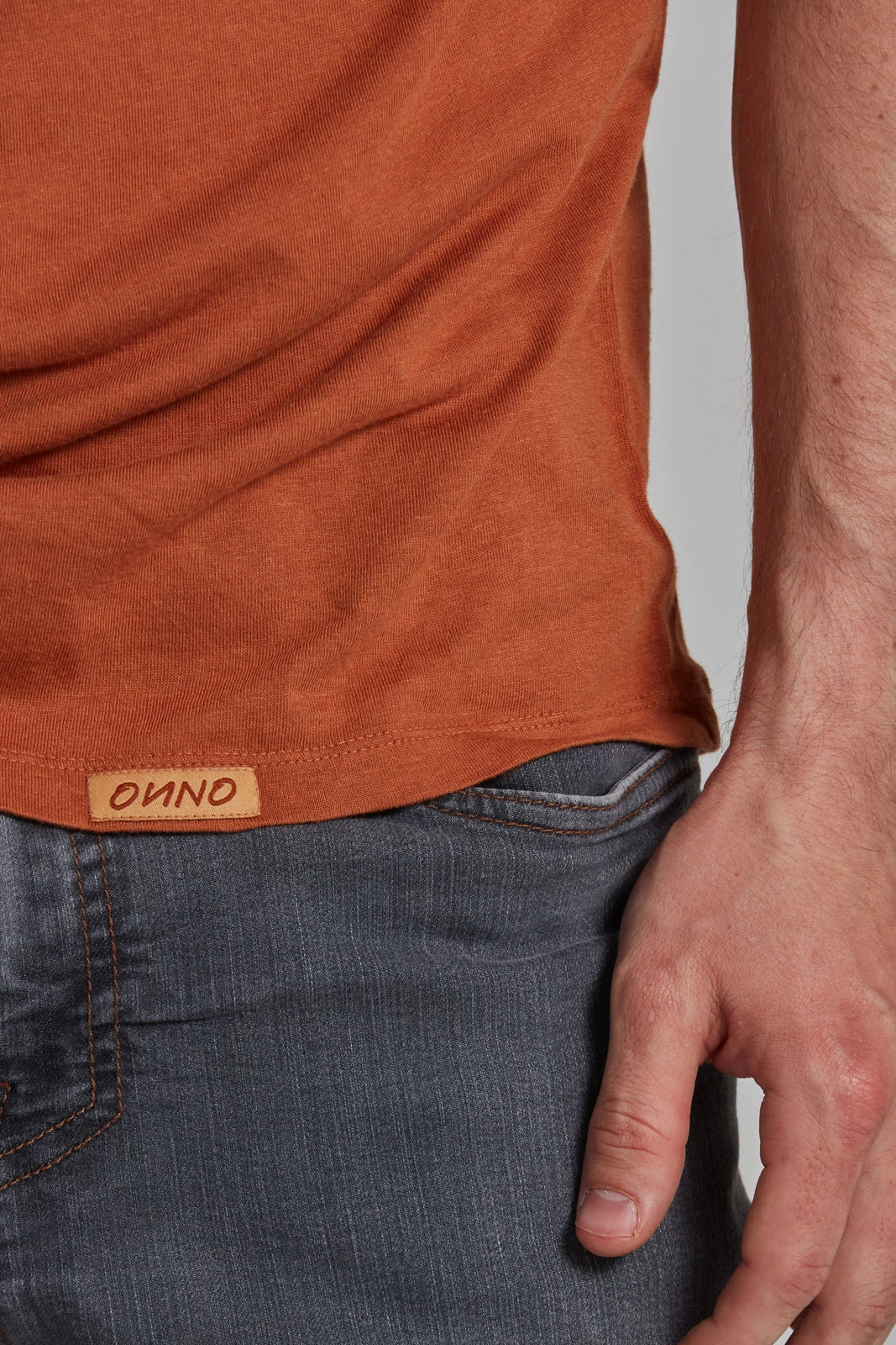 ONNO bamboo t-shirt in Rust, Nic is 5'11" and wearing size M.