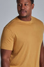 ONNO bamboo t-shirt in Mustard, Golden is 6'0" and wearing size L.