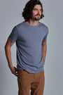 ONNO bamboo t-shirt in Stone, Nic is 5'11" and wearing size M.