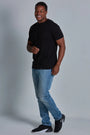 ONNO bamboo t-shirt in Black, Golden is 6'0" and wearing size L.