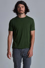 ONNO bamboo t-shirt in Moss Green, Nic is 5'11" and wearing size M.