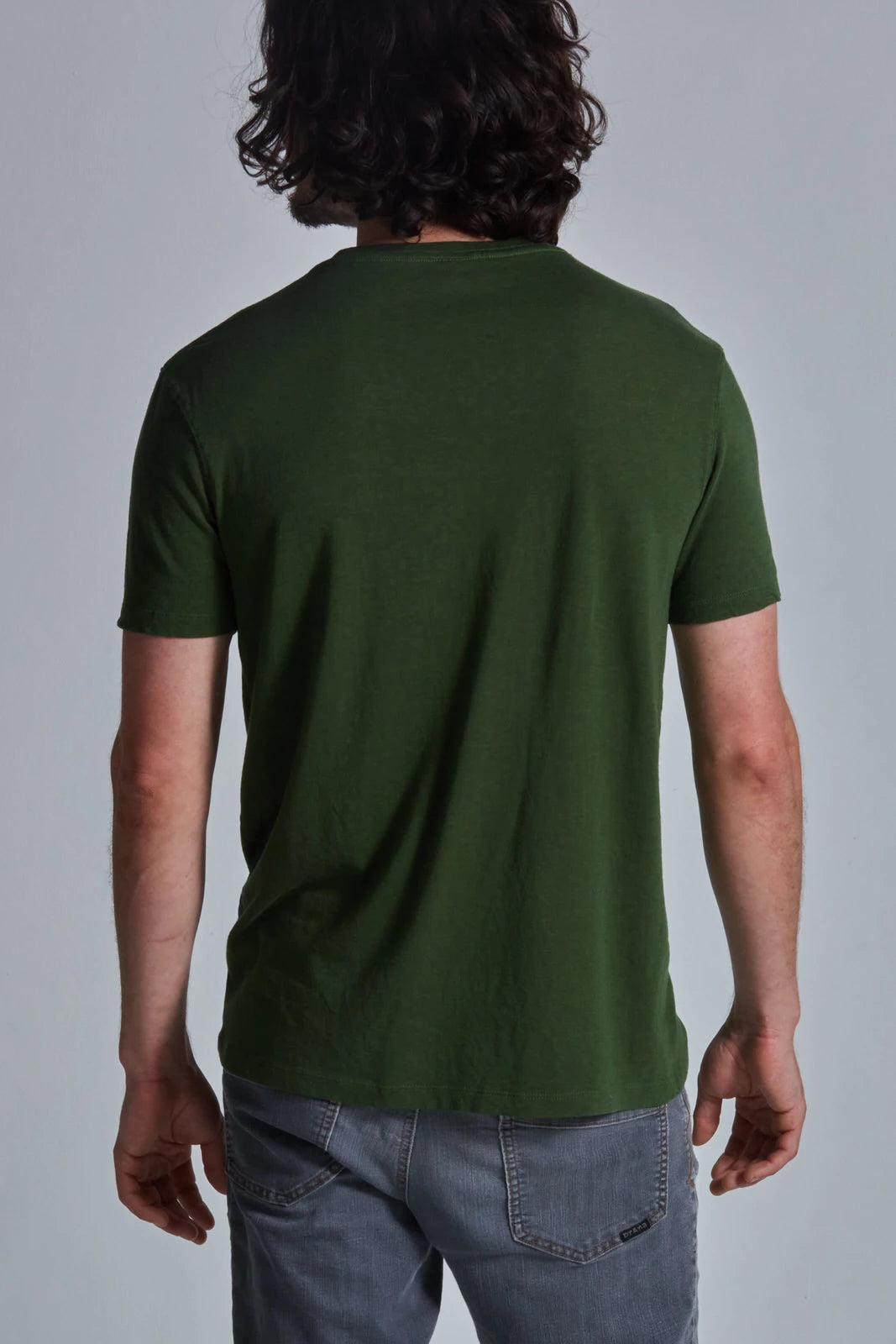 ONNO bamboo t-shirt in Moss Green, Nic is 5'11" and wearing size M.