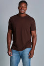 ONNO bamboo t-shirt in Espresso, Golden is 6'0" and wearing size L.