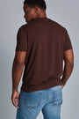 ONNO bamboo t-shirt in Espresso, Golden is 6'0" and wearing size L.