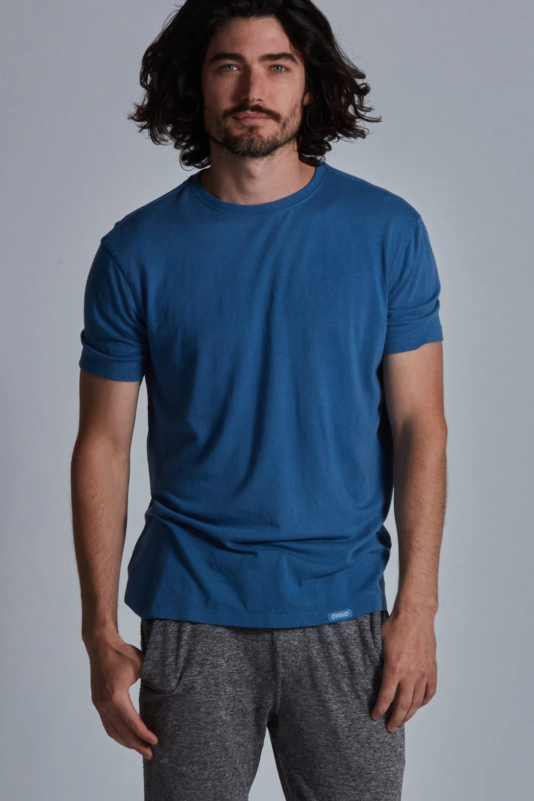 ONNO bamboo t-shirt in Sea Blue, Nic is 5'11" and wearing size M.