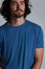 ONNO bamboo t-shirt in Sea Blue, Nic is 5'11" and wearing size M.