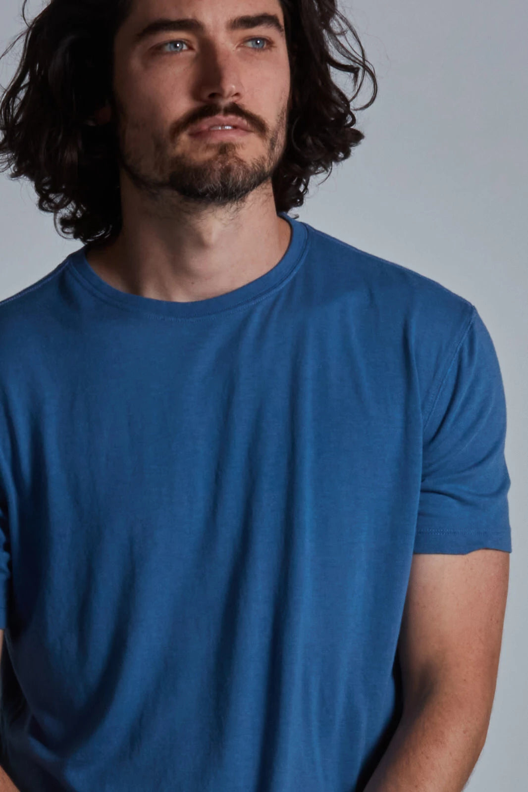 ONNO bamboo t-shirt in Sea Blue, Nic is 5'11" and wearing size M.