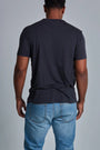 ONNO bamboo t-shirt in Charcoal Blue, Golden is 6'0" and wearing size L.