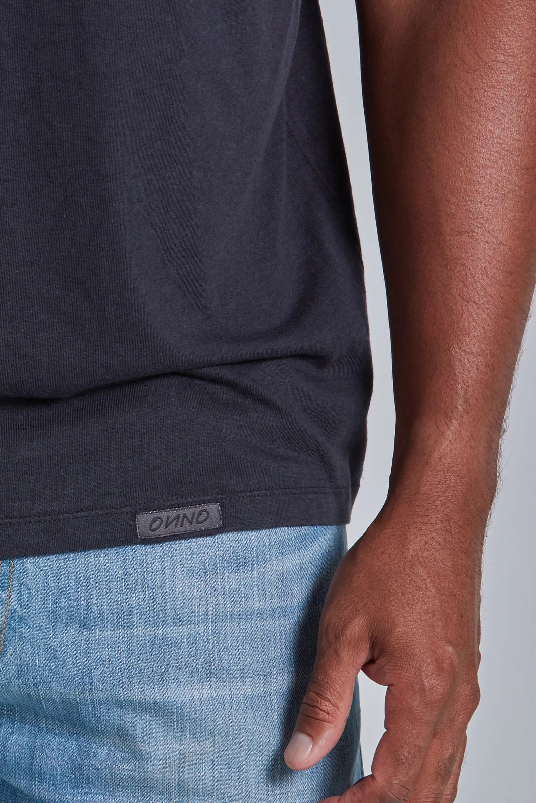 ONNO bamboo t-shirt in Charcoal Blue, Golden is 6'0" and wearing size L.