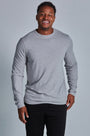 ONNO long sleeve bamboo t-shirt in Heathered Granite Unpatched, Golden is 6'0" and wearing size L.