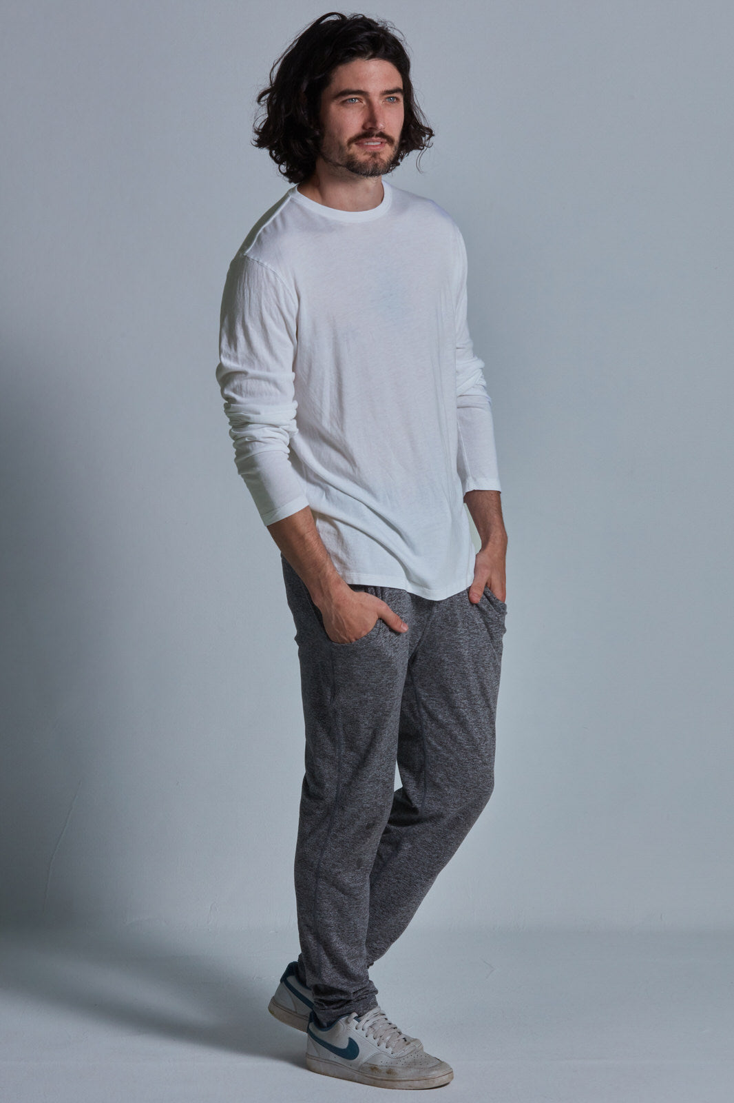 ONNO long sleeve bamboo t-shirt in Natural Unpatched, Nic is 5'11" and wearing size M.