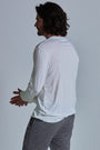 ONNO long sleeve bamboo t-shirt in Natural Unpatched, Nic is 5'11" and wearing size M.