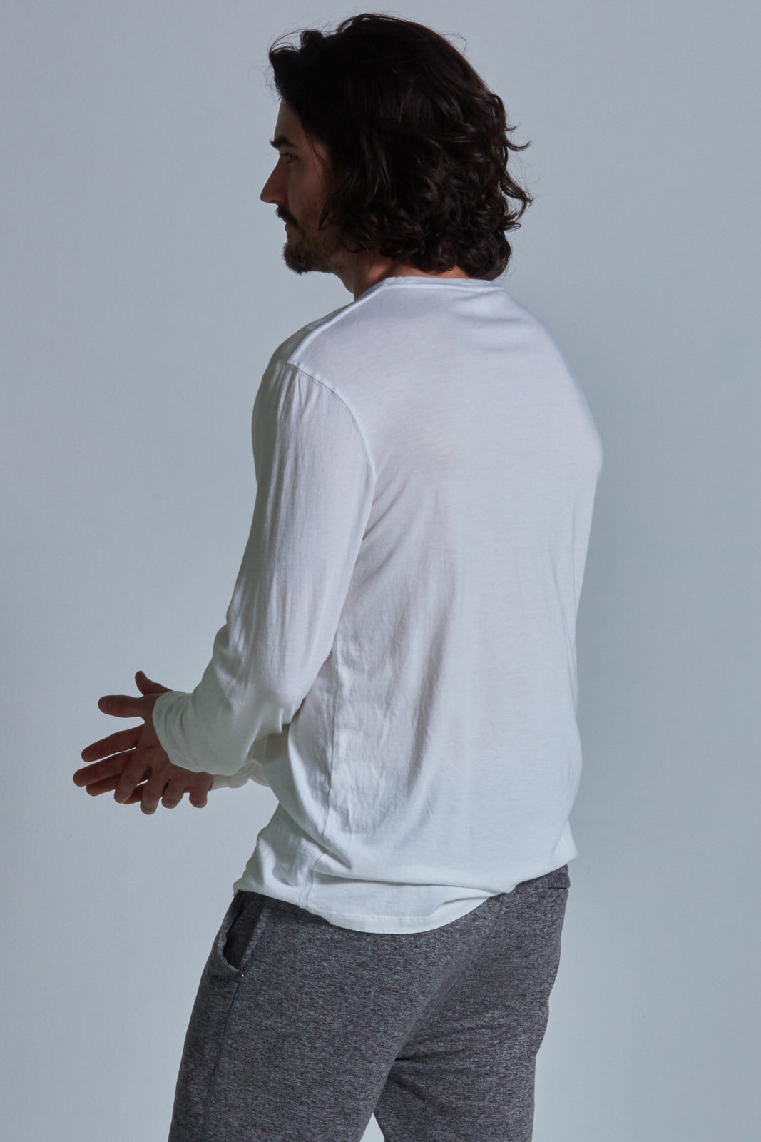 ONNO long sleeve bamboo t-shirt in Natural Unpatched, Nic is 5'11" and wearing size M.