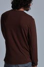ONNO long sleeve bamboo t-shirt in Espresso Unpatched, Nic is 5'11" and wearing size M.