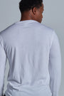 ONNO long sleeve bamboo t-shirt in White, Golden is 6'0" and wearing size L.