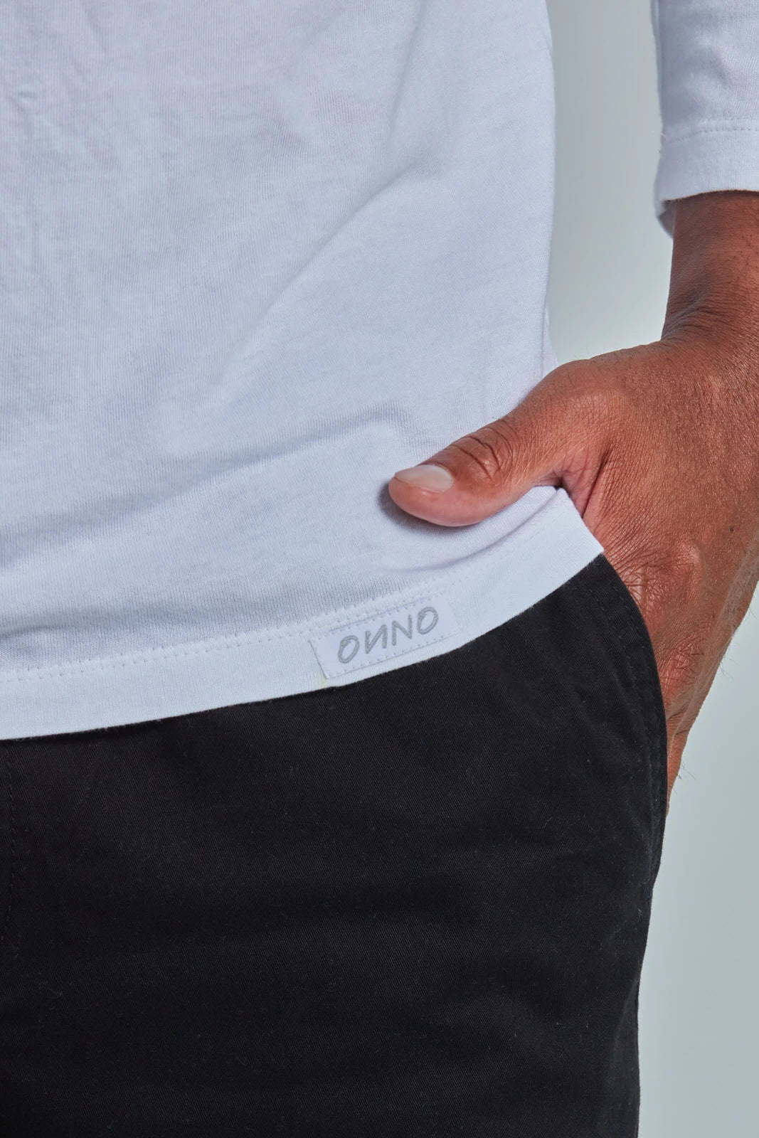 ONNO long sleeve bamboo t-shirt in White, Golden is 6'0" and wearing size L.