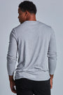 ONNO long sleeve bamboo t-shirt in Heathered Granite, Golden is 6'0" and wearing size L.
