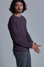 ONNO long sleeve bamboo t-shirt in Dirty Purple, Nic is 5'11" and wearing size M.