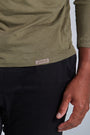 ONNO long sleeve bamboo t-shirt in Cypress, Golden is 6'0" and wearing size L.