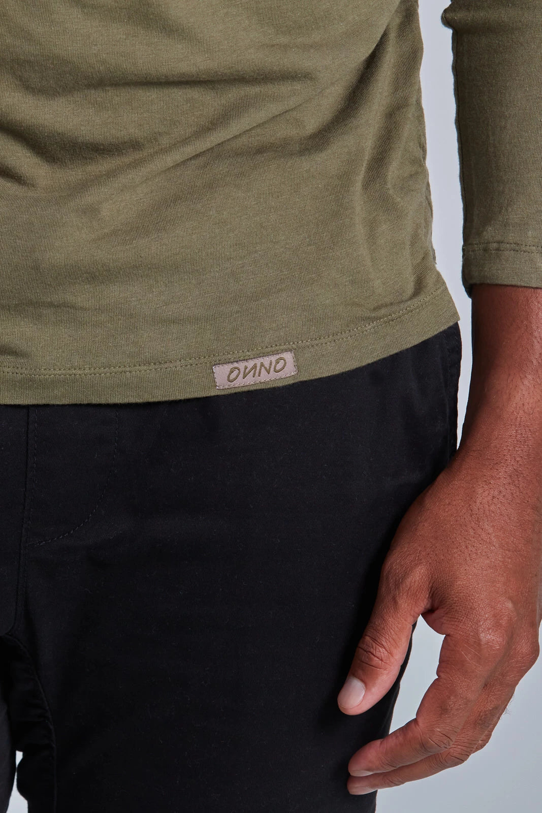 ONNO long sleeve bamboo t-shirt in Cypress, Golden is 6'0" and wearing size L.