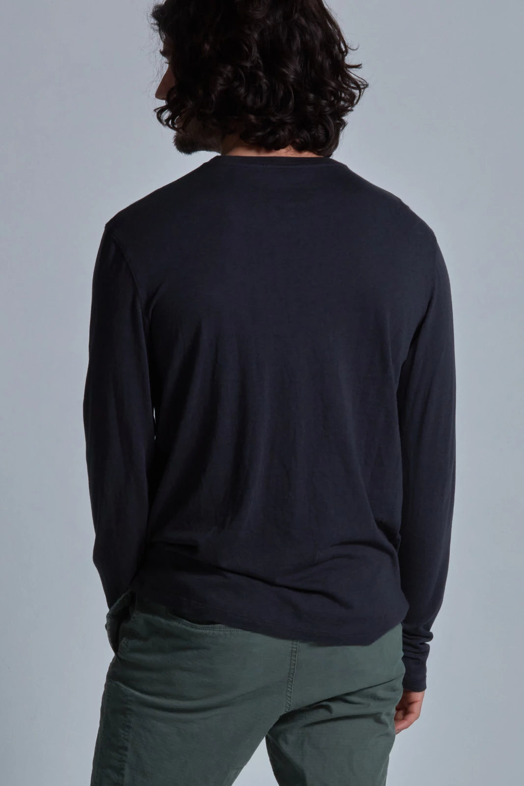 ONNO long sleeve bamboo t-shirt in Charcoal Blue, Nic is 5'11" and wearing size M.