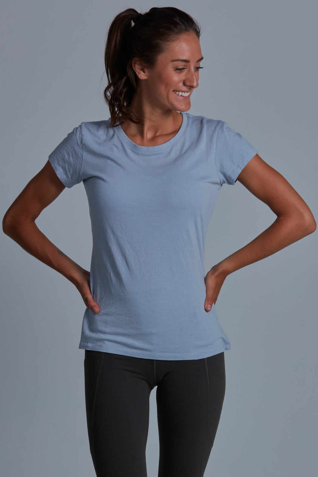 ONNO bamboo t-shirt in Sky Blue Unpatched, Christina is 5'9" and wearing size S.
