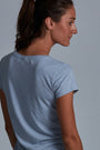 ONNO bamboo t-shirt in Sky Blue Unpatched, Christina is 5'9" and wearing size S.