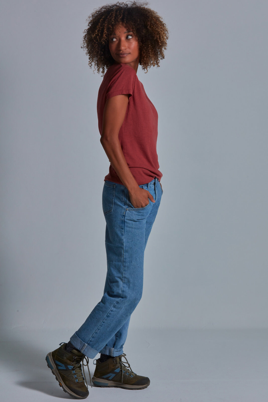 ONNO bamboo t-shirt in Brick Unpatched, Sage is 5'7" and wearing size XS.