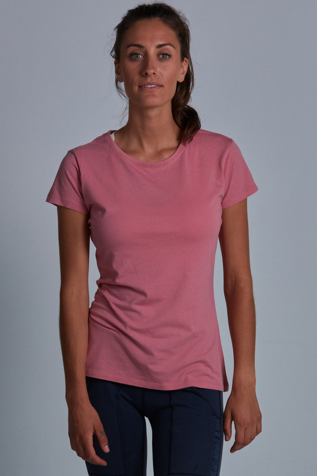 ONNO bamboo t-shirt in Vintage Pink Unpatched, Christina is 5'9" and wearing size S.