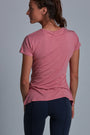 ONNO bamboo t-shirt in Vintage Pink Unpatched, Christina is 5'9" and wearing size S.