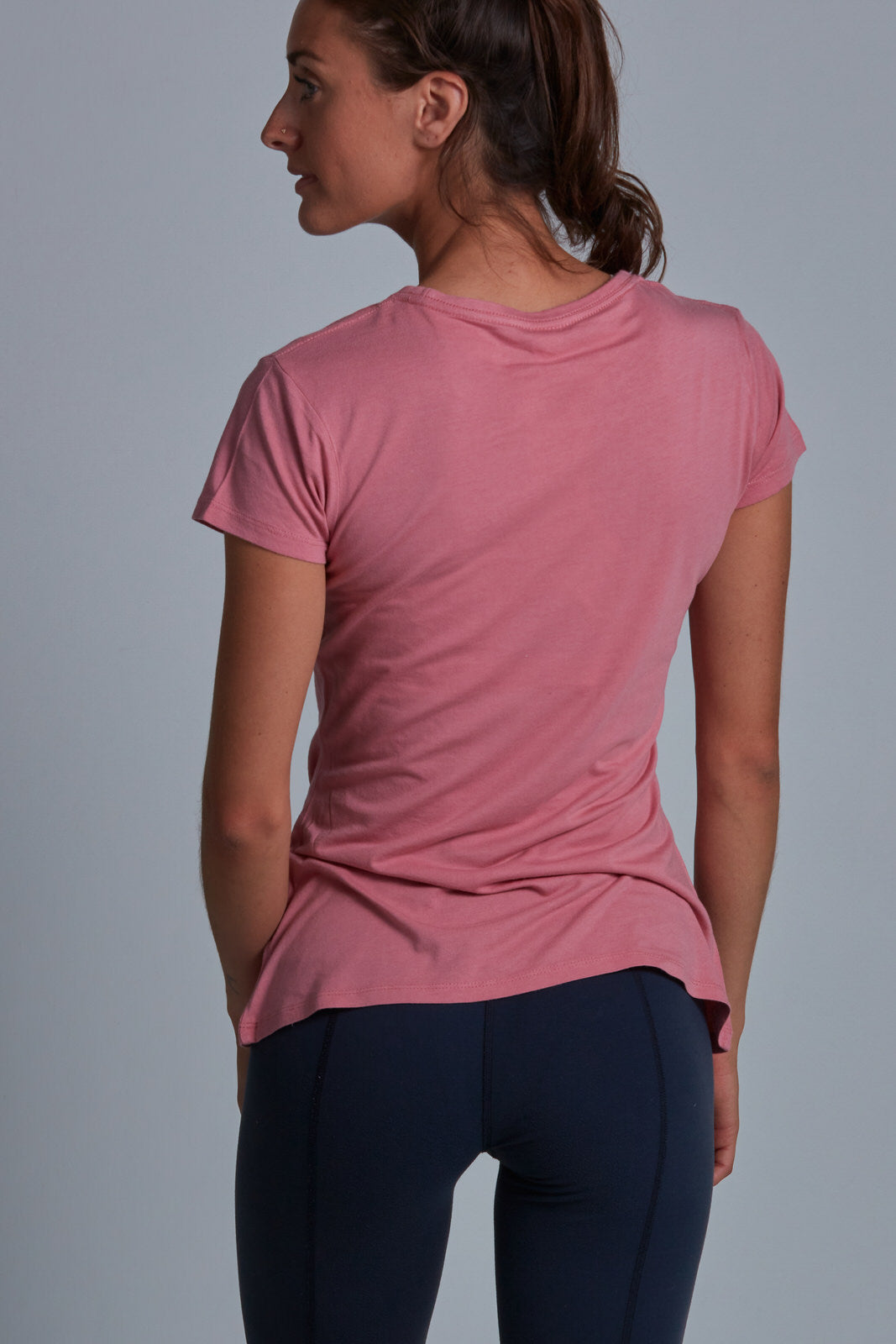 ONNO bamboo t-shirt in Vintage Pink Unpatched, Christina is 5'9" and wearing size S.