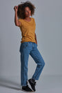 ONNO bamboo t-shirt in Mustard Unpatched, Sage is 5'7" and wearing size XS.