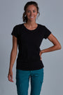 ONNO bamboo t-shirt in Black Unpatched, Christina is 5'9" and wearing size S.